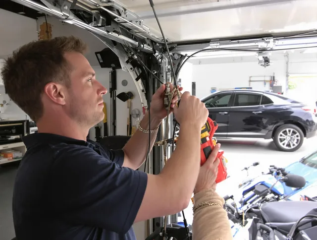 Rock Hill Garage Door Repair safety certified technician performing cable replacement in Rock Hill