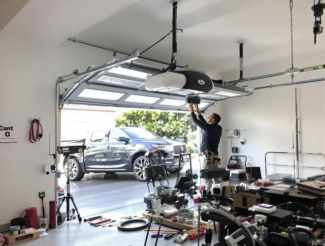 Rock Hill Garage Door Repair specialist installing smart garage door opener system in Rock Hill home