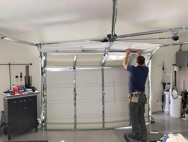 Rock Hill Garage Door Repair specialist performing precise section replacement on Rock Hill garage door