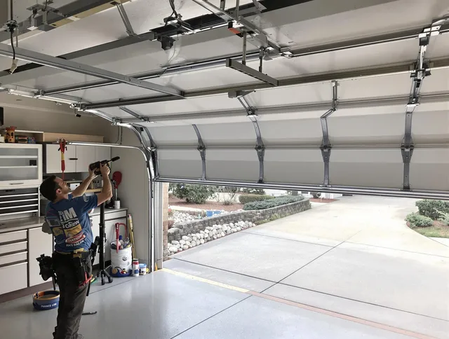 Garage door track repair service by Rock Hill Garage Door Repair in Rock Hill